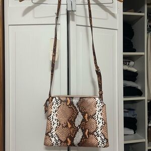 Snake-Print Crossbody Bag in Brown - a new day